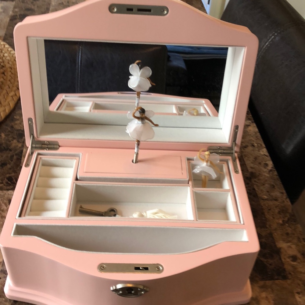 Beautiful “Pink” musical jewelry box. Interchangeable ethnic ballerina.